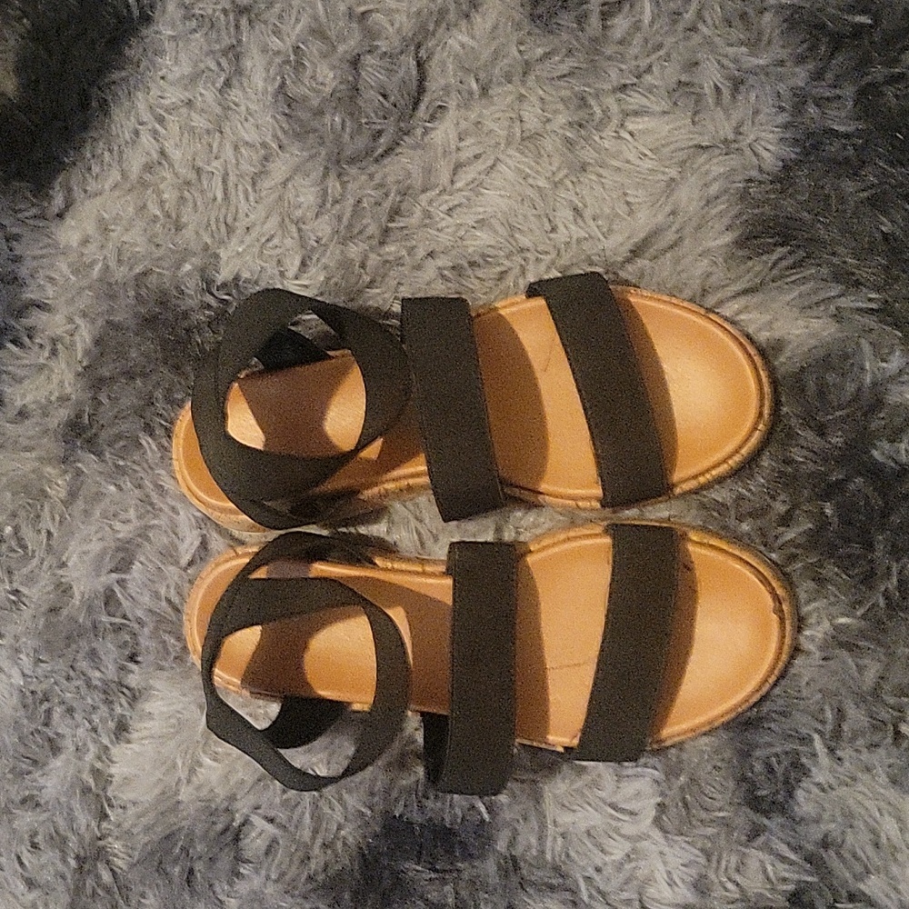 Girls black strappy wedged sandal. Size 4. Like new.